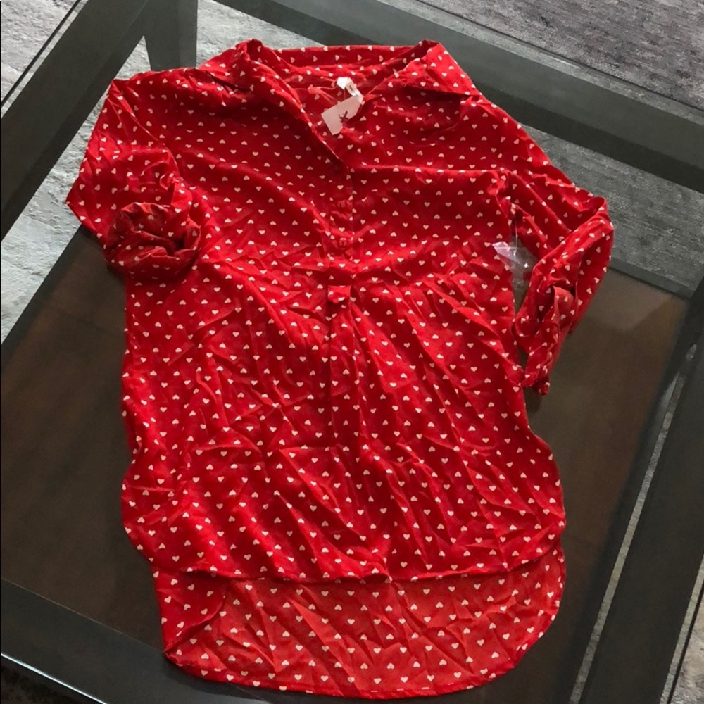 Red heart print blouse.